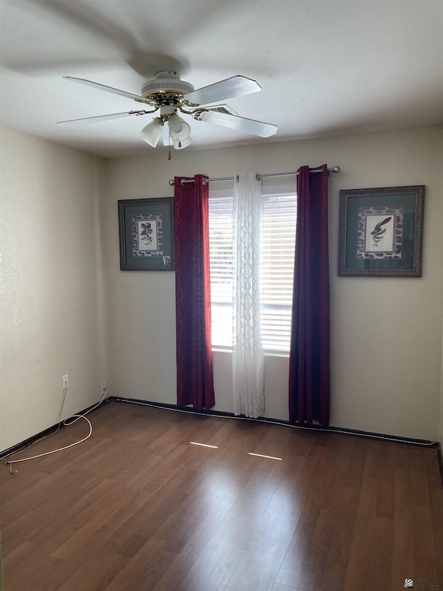 1603 S 31st Dr, Yuma, AZ 85364 - spare room with a ceiling fan and wood finished floors