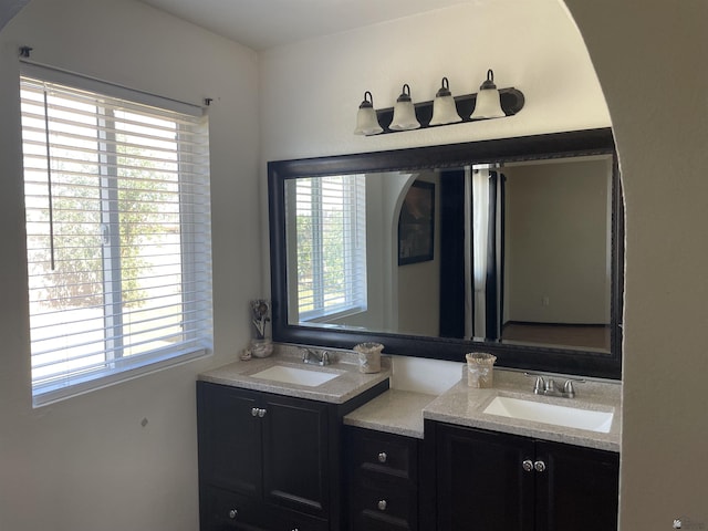 1603 S 31st Dr, Yuma, AZ 85364 - full bathroom with double vanity and plenty of natural light