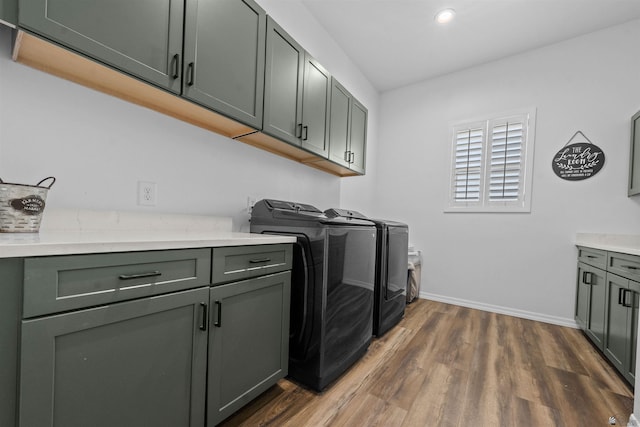 5922 E 47th St, Yuma, AZ 85365 - laundry area with cabinet space, washing machine and dryer, dark wood-style floors, and recessed lighting