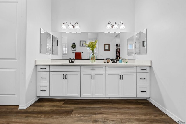 5922 E 47th St, Yuma, AZ 85365 - bathroom featuring double vanity and wood finished floors