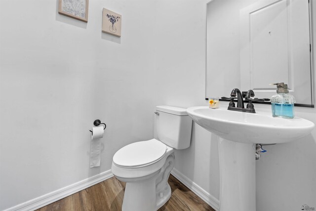 5922 E 47th St, Yuma, AZ 85365 - bathroom featuring toilet and wood finished floors