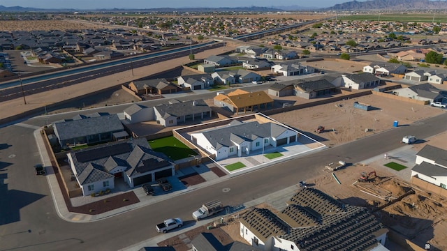 5922 E 47th St, Yuma, AZ 85365 - aerial view of residential area featuring a mountainous background