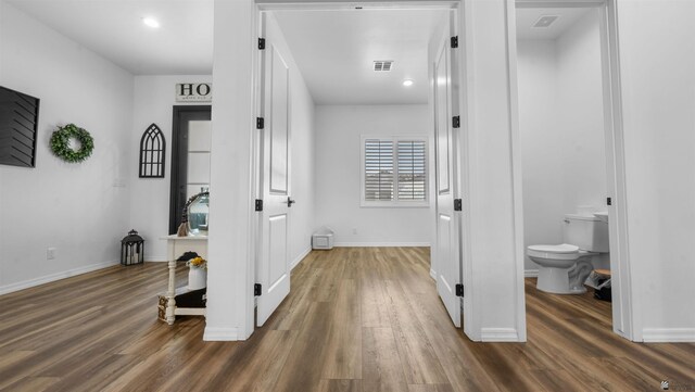 5922 E 47th St, Yuma, AZ 85365 - hallway featuring wood finished floors and baseboards