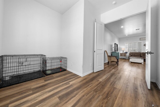 5922 E 47th St, Yuma, AZ 85365 - spare room featuring wood finished floors and a smoke detector