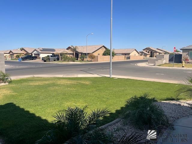 view of yard with a residential view