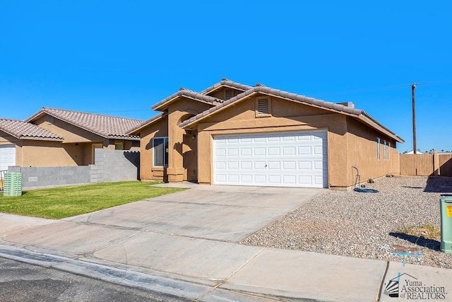 single story home with fence, an attached garage, and stucco siding