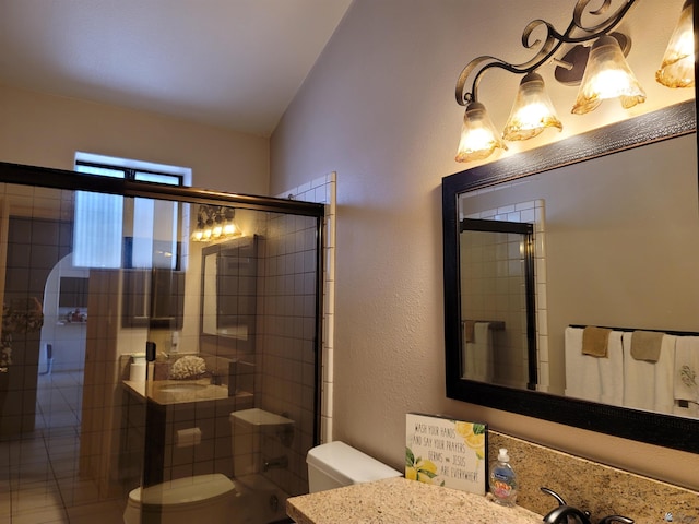 10842 S Via Salida, Yuma, AZ 85367 - full bathroom featuring vanity, a textured wall, a stall shower, and toilet