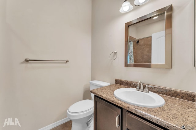 full bathroom featuring vanity, tile patterned flooring, curtained shower, and toilet