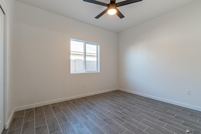 10778 E 45th Ln, Yuma, AZ 85367 - unfurnished room with ceiling fan, baseboards, and wood tiled floor