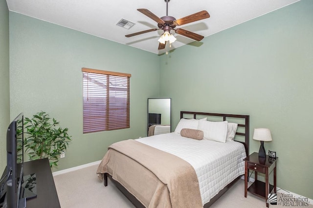 12147 E 33rd St, Yuma, AZ 85367 - bedroom featuring carpet floors, baseboards, visible vents, and ceiling fan
