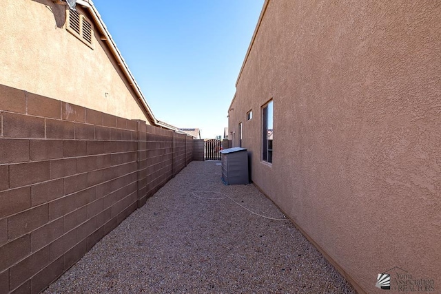 12147 E 33rd St, Yuma, AZ 85367 - view of property exterior featuring stucco siding and fence