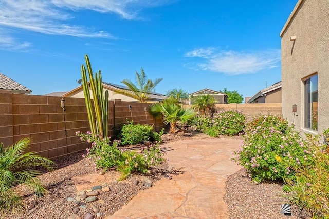 12147 E 33rd St, Yuma, AZ 85367 - view of yard with a patio and a fenced backyard