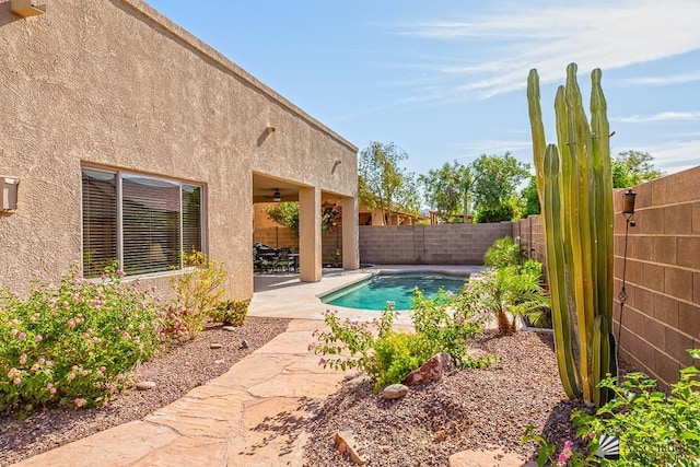 12147 E 33rd St, Yuma, AZ 85367 - view of swimming pool with a patio, a fenced in pool, and a fenced backyard