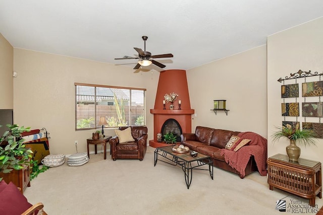 12147 E 33rd St, Yuma, AZ 85367 - carpeted living room featuring a ceiling fan and a fireplace