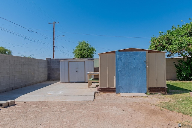 1221 S 10th Ave, Yuma, AZ 85364 - view of shed featuring a fenced backyard