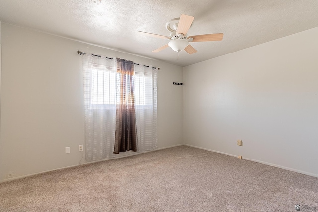 1221 S 10th Ave, Yuma, AZ 85364 - carpeted spare room featuring a ceiling fan and a textured ceiling