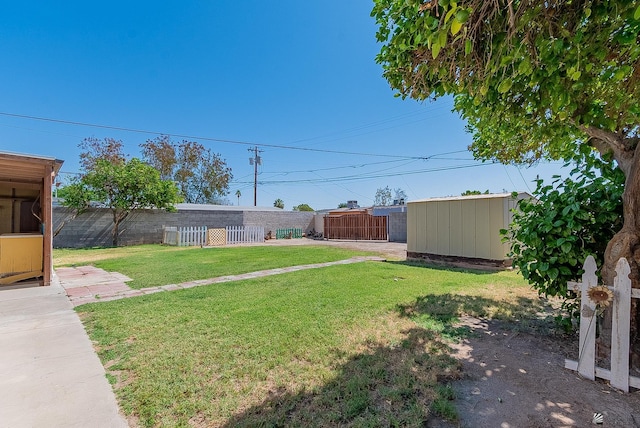 1221 S 10th Ave, Yuma, AZ 85364 - fenced backyard featuring a storage shed