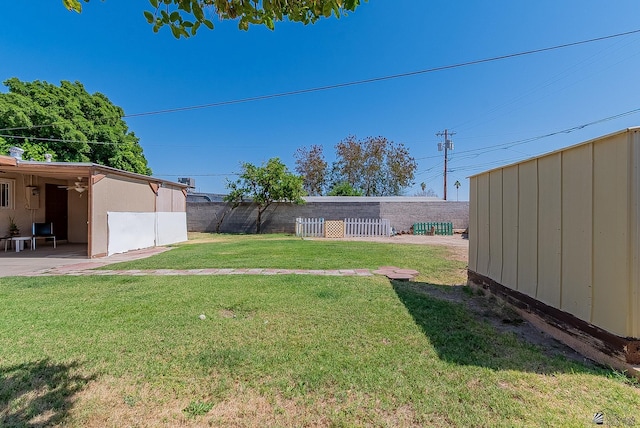 1221 S 10th Ave, Yuma, AZ 85364 - view of yard featuring a patio area and a ceiling fan