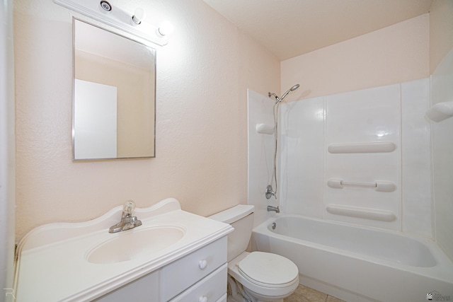 full bathroom featuring tile patterned floors, shower / bathing tub combination, vanity, and toilet