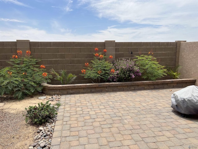 view of patio featuring a fenced backyard