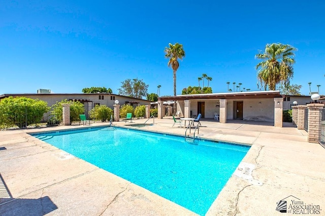 1465 E Laguna Pl Unit 4, Yuma, AZ 85365 - pool featuring a patio area and fence