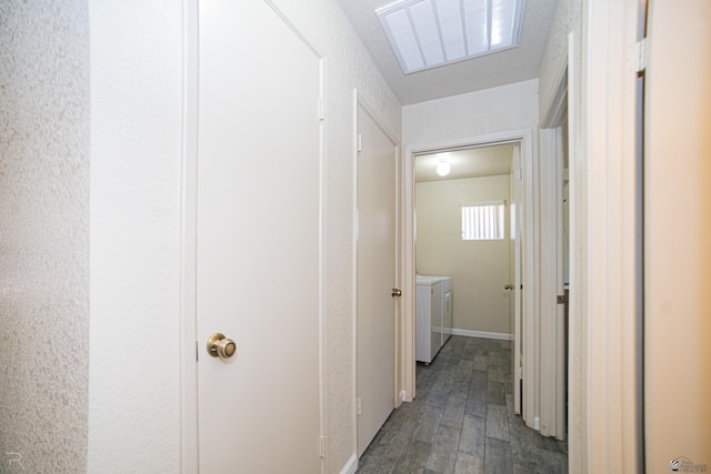 6340 E 45th Pl, Yuma, AZ 85365 - corridor featuring washer and dryer and wood finished floors