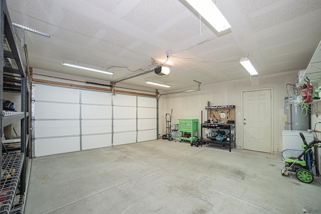 6340 E 45th Pl, Yuma, AZ 85365 - garage with strapped water heater and a garage door opener