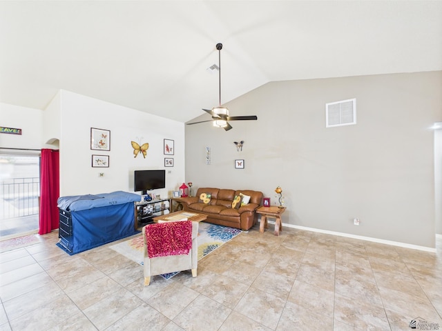 5936 E 39th St, Yuma, AZ 85365 - living area with vaulted ceiling, a ceiling fan, light tile patterned floors, and baseboards