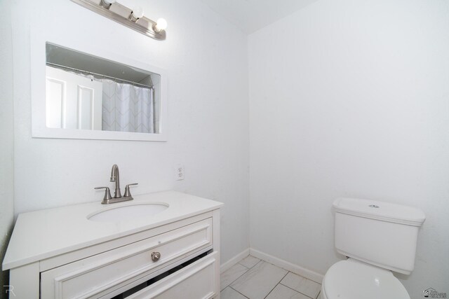 12687 E 42nd Pl, Yuma, AZ 85367 - full bathroom featuring vanity, baseboards, toilet, and marble finish floor