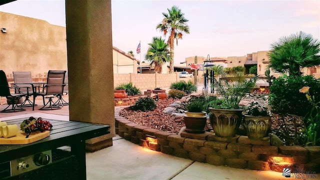 12806 E 49th Dr, Yuma, AZ 85367 - view of patio featuring outdoor dining area and fence