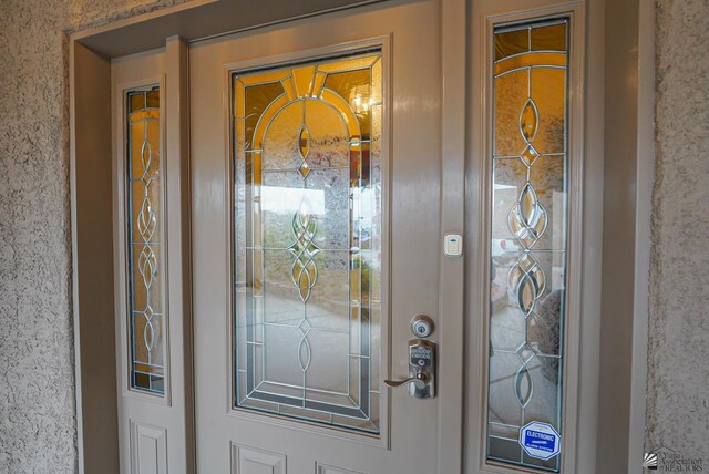 12806 E 49th Dr, Yuma, AZ 85367 - view of exterior entry featuring stucco siding