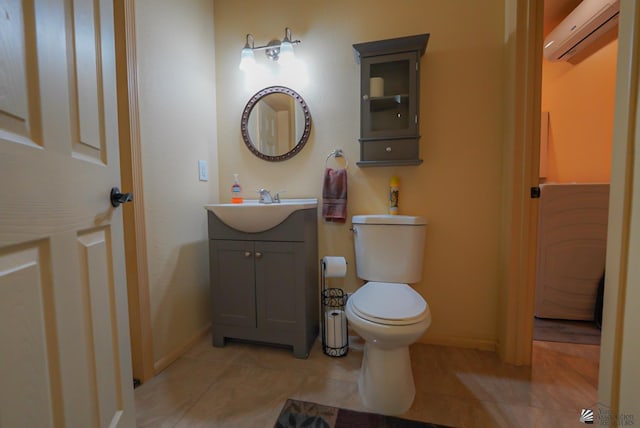 12806 E 49th Dr, Yuma, AZ 85367 - bathroom with toilet, baseboards, tile patterned floors, and a wall mounted air conditioner