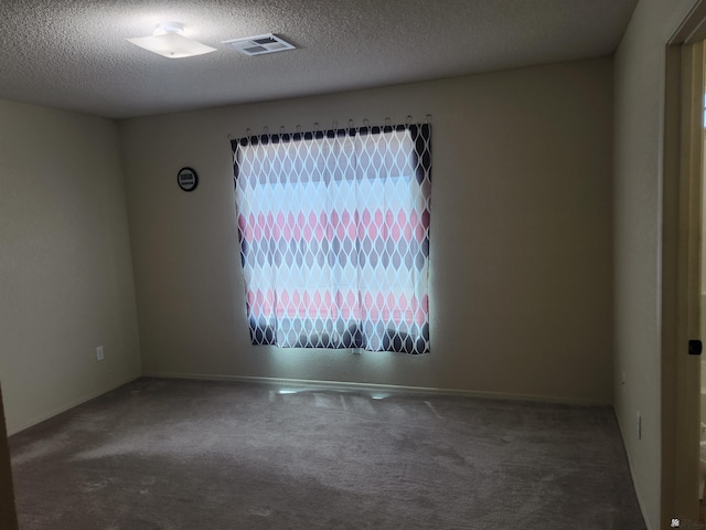 3708 S Desert Oasis Dr, Yuma, AZ 85365 - carpeted spare room featuring a textured ceiling and baseboards