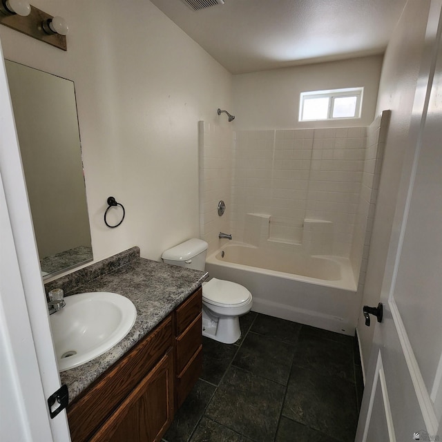 bathroom featuring washtub / shower combination, toilet, visible vents, and vanity