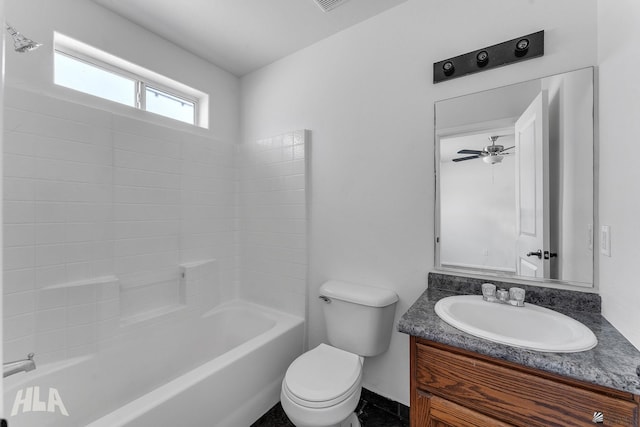 full bath featuring tub / shower combination, toilet, and vanity