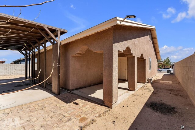 view of patio with fence