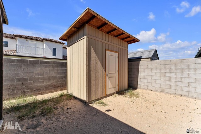 view of shed featuring a fenced backyard