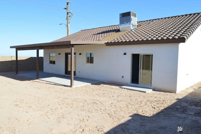 13112 E 54th St, Yuma, AZ 85367 - back of house with stucco siding, a patio area, and a tiled roof