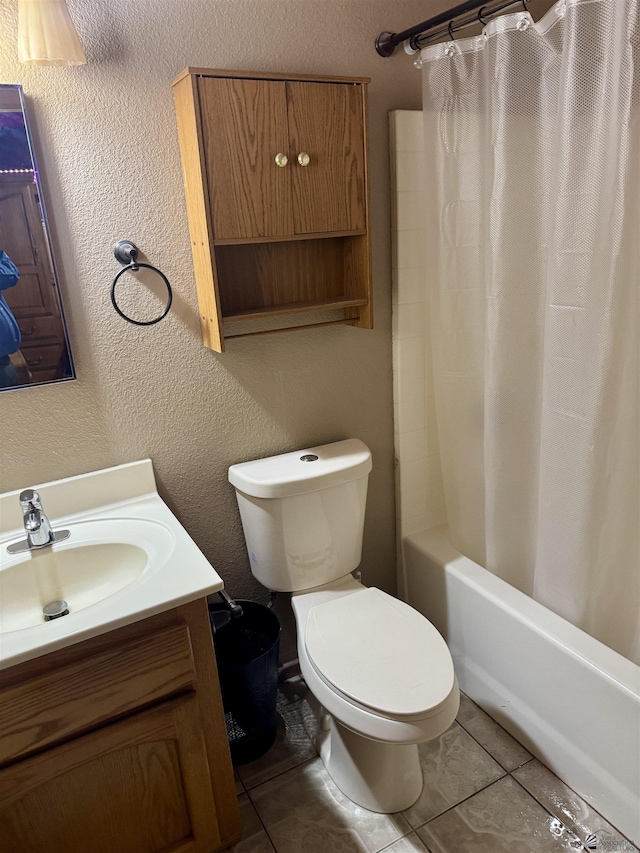 219 E Rio Sonora St, San Luis, AZ 85336 - bathroom with vanity, shower / tub combo, a textured wall, and tile patterned floors