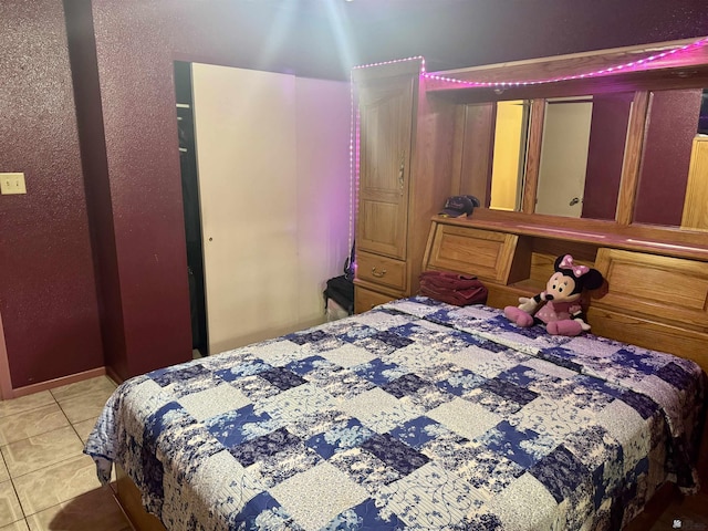 219 E Rio Sonora St, San Luis, AZ 85336 - bedroom with tile patterned flooring