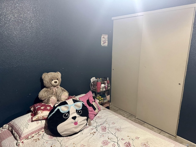 219 E Rio Sonora St, San Luis, AZ 85336 - tiled bedroom with a closet