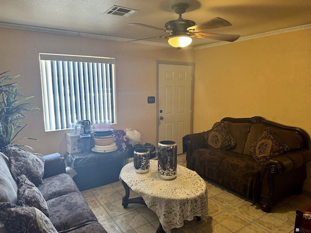 219 E Rio Sonora St, San Luis, AZ 85336 - living area featuring light tile patterned floors, a ceiling fan, and ornamental molding