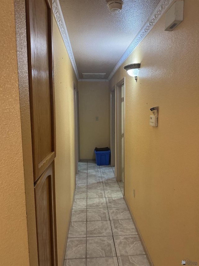 219 E Rio Sonora St, San Luis, AZ 85336 - corridor featuring a textured ceiling and crown molding