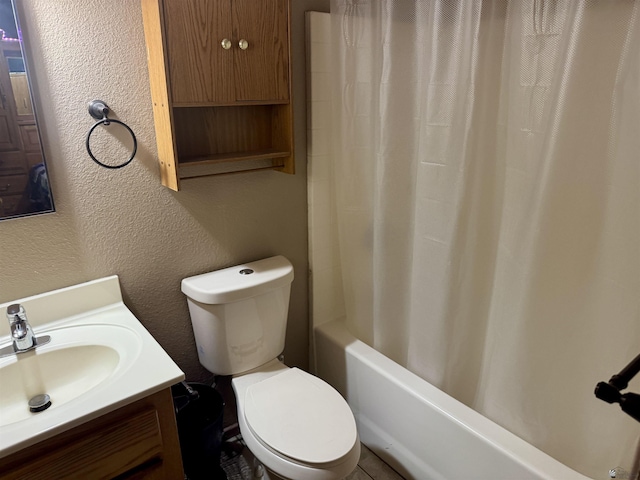 219 E Rio Sonora St, San Luis, AZ 85336 - full bathroom featuring vanity, a textured wall, and shower / bath combo