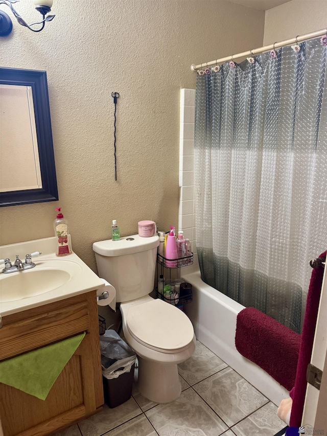 219 E Rio Sonora St, San Luis, AZ 85336 - full bath with vanity, shower / bath combination with curtain, tile patterned floors, and a textured wall