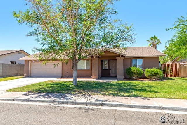 11279 E 26th Ln, Yuma, AZ 85367 - single story home featuring a garage, concrete driveway, and stucco siding