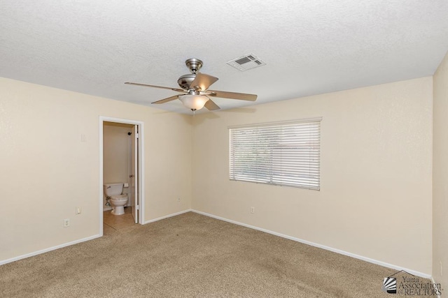 11279 E 26th Ln, Yuma, AZ 85367 - spare room with light carpet, a ceiling fan, and a textured ceiling