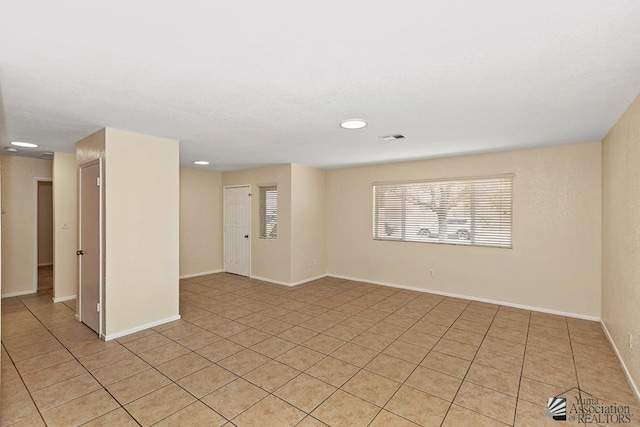 11279 E 26th Ln, Yuma, AZ 85367 - empty room featuring light tile patterned floors and baseboards