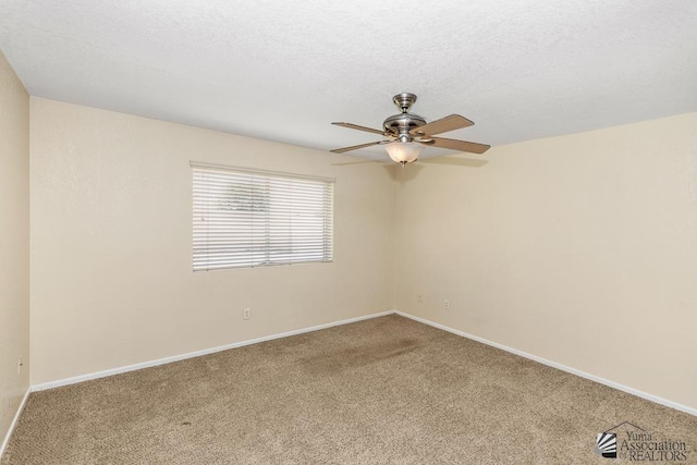 11279 E 26th Ln, Yuma, AZ 85367 - carpeted spare room featuring a ceiling fan and baseboards