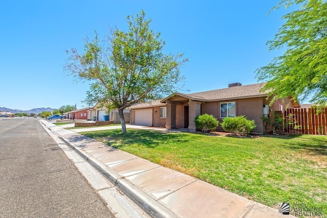 11279 E 26th Ln, Yuma, AZ 85367 - ranch-style home with a garage, stucco siding, concrete driveway, and a mountain view